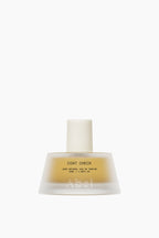 Coat Check | A Dark Smoky Amber