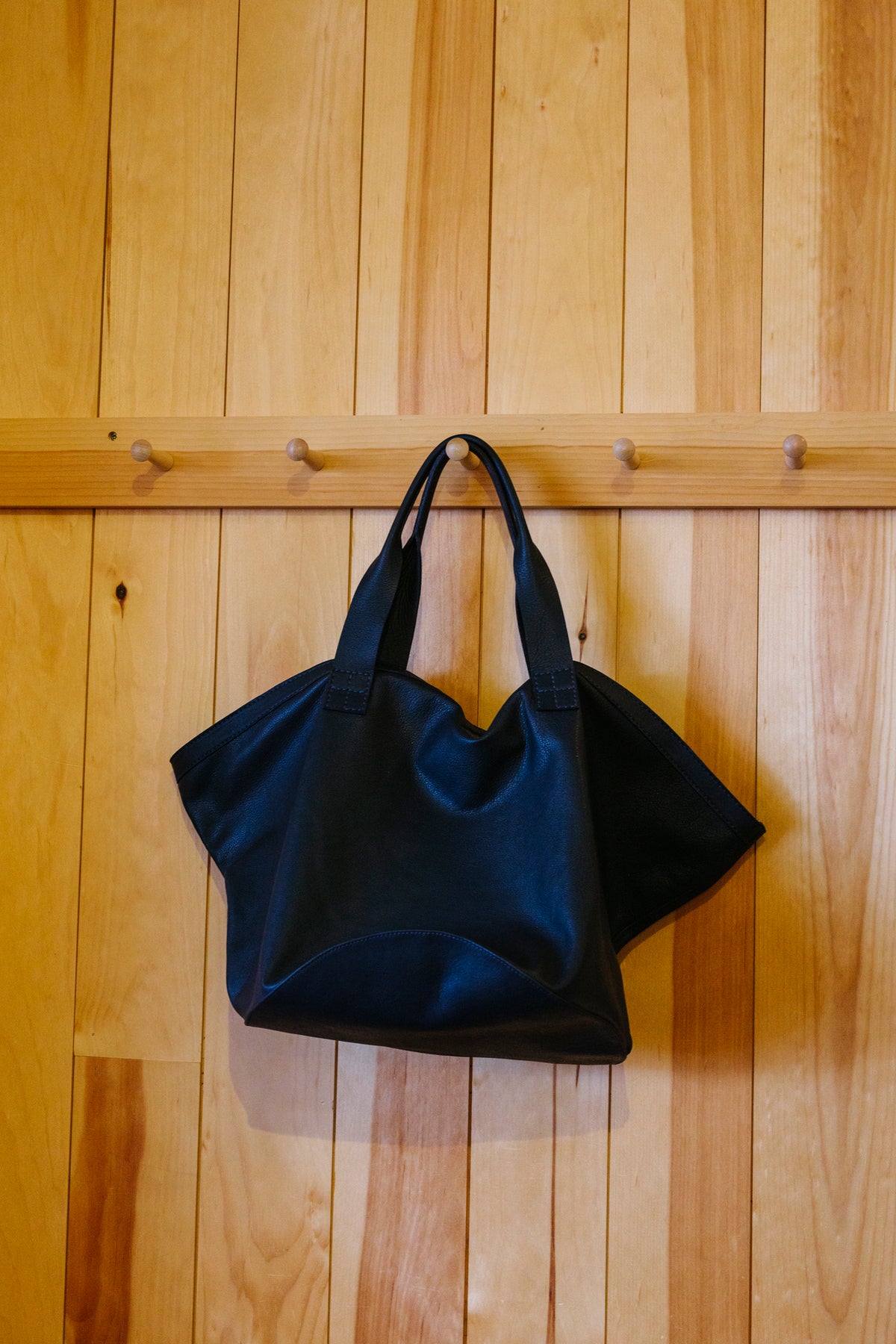 Circle Bottom Leather Carry All