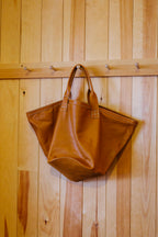 Circle Bottom Leather Carry All
