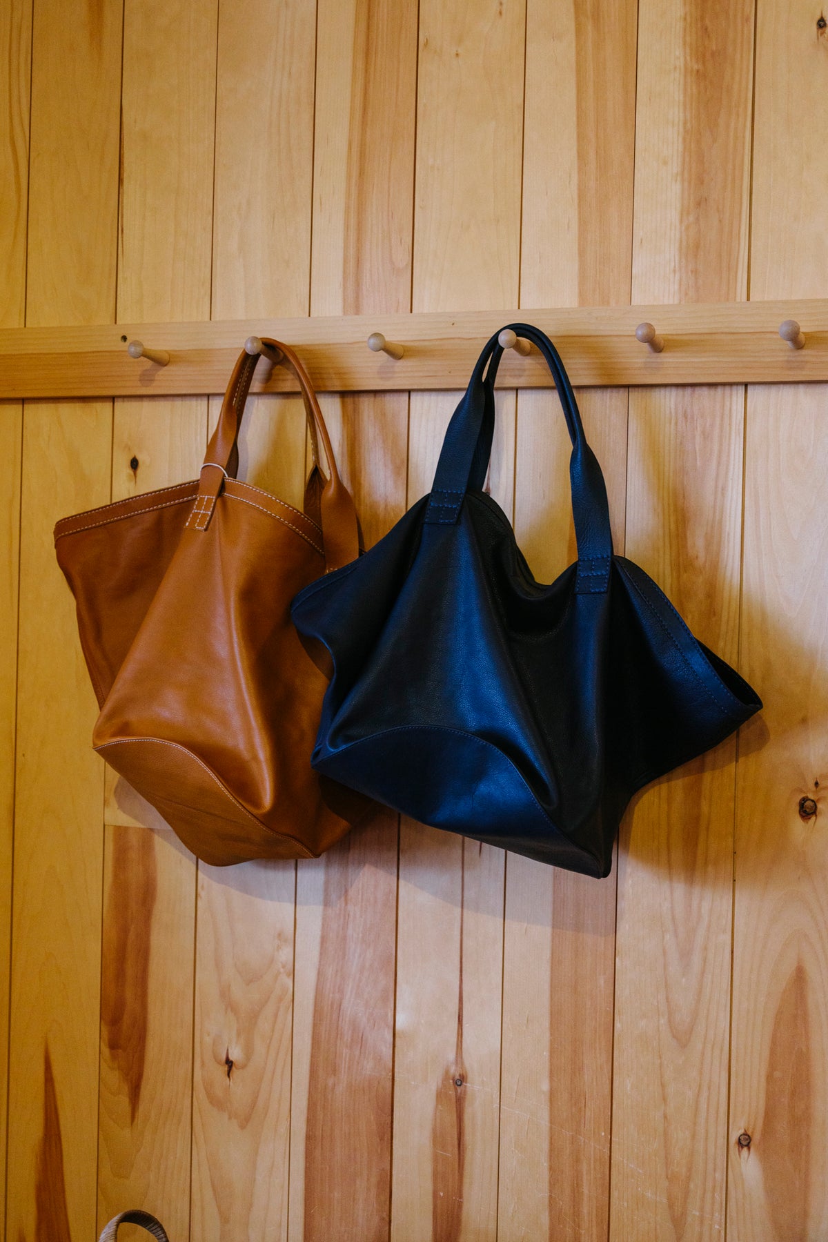 Circle Bottom Leather Carry All
